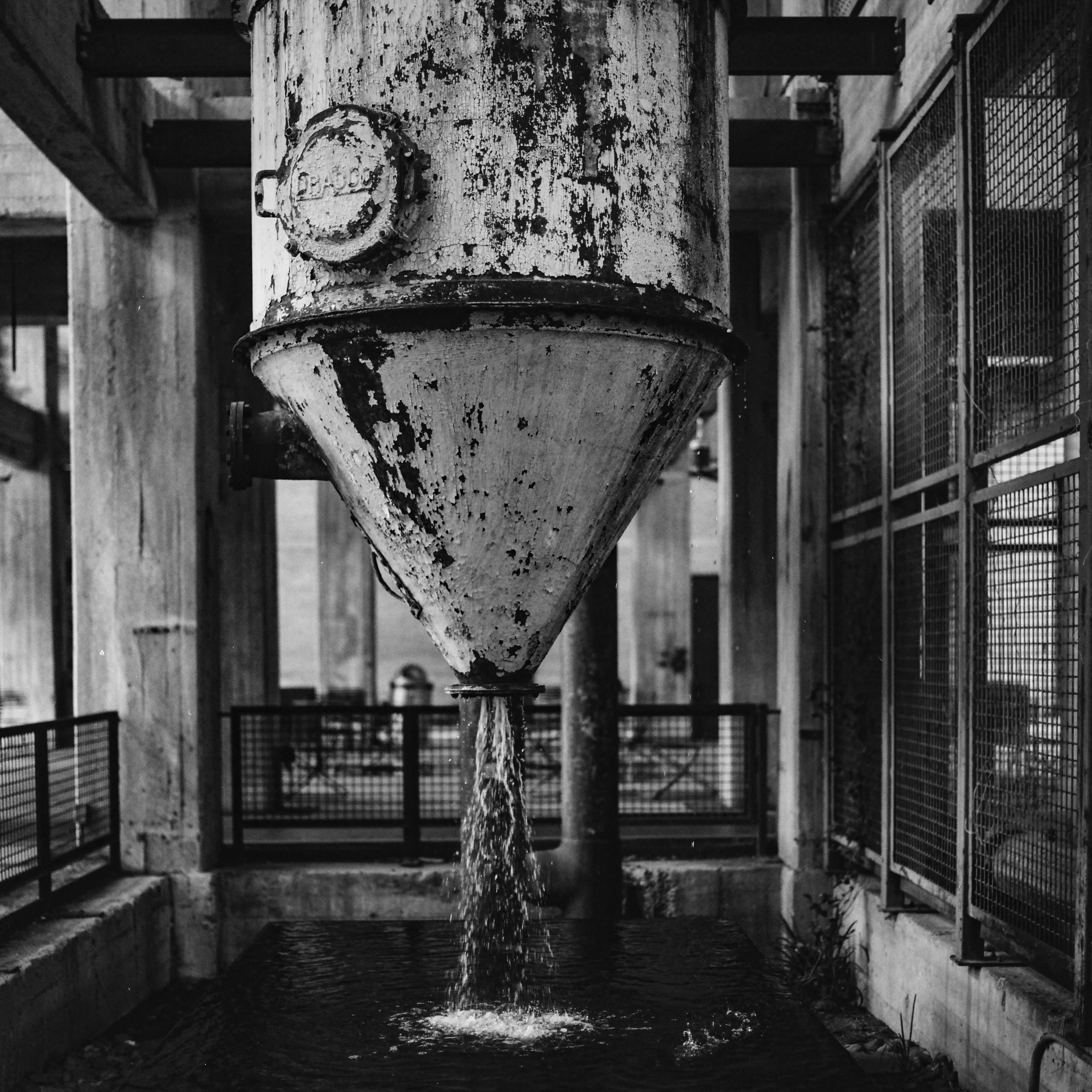 Concrete funnel pouring water